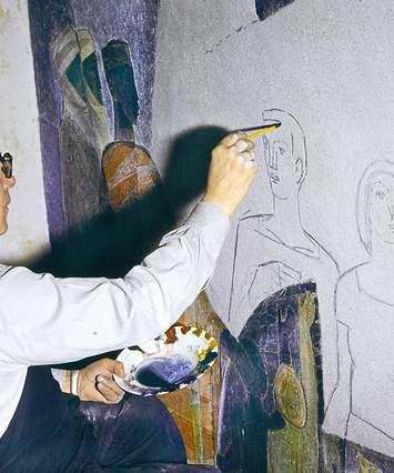 Finnish artist, Lennart Segerståle, at work on his mural in Caux