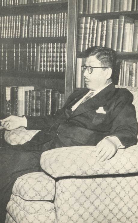 Tetsu Katayama sitting in a chair