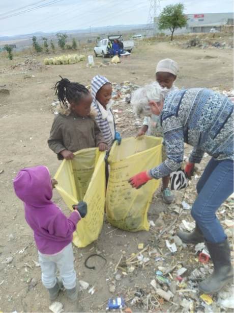 Helen Duigan picking up litter